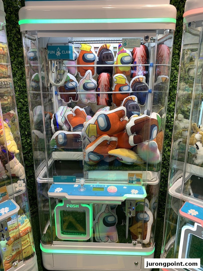 A Fun Claw machine filled with colorful Among Us plush toys, ready to be won.