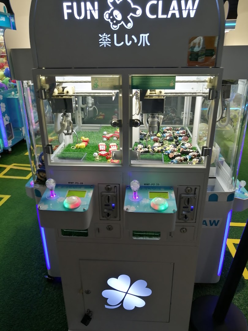 A Fun Claw arcade machine filled with various prizes, ready for play.