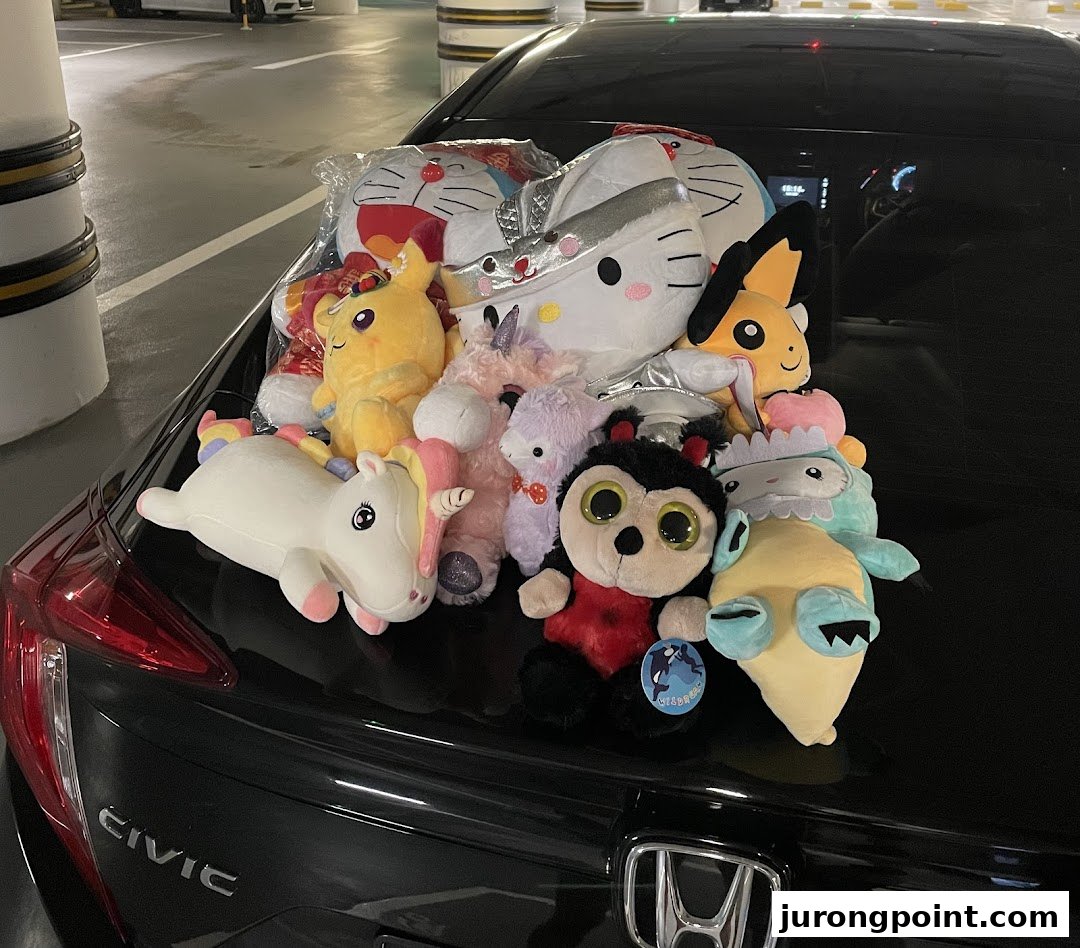A car trunk filled with a variety of plush toys won from Fun Claw.