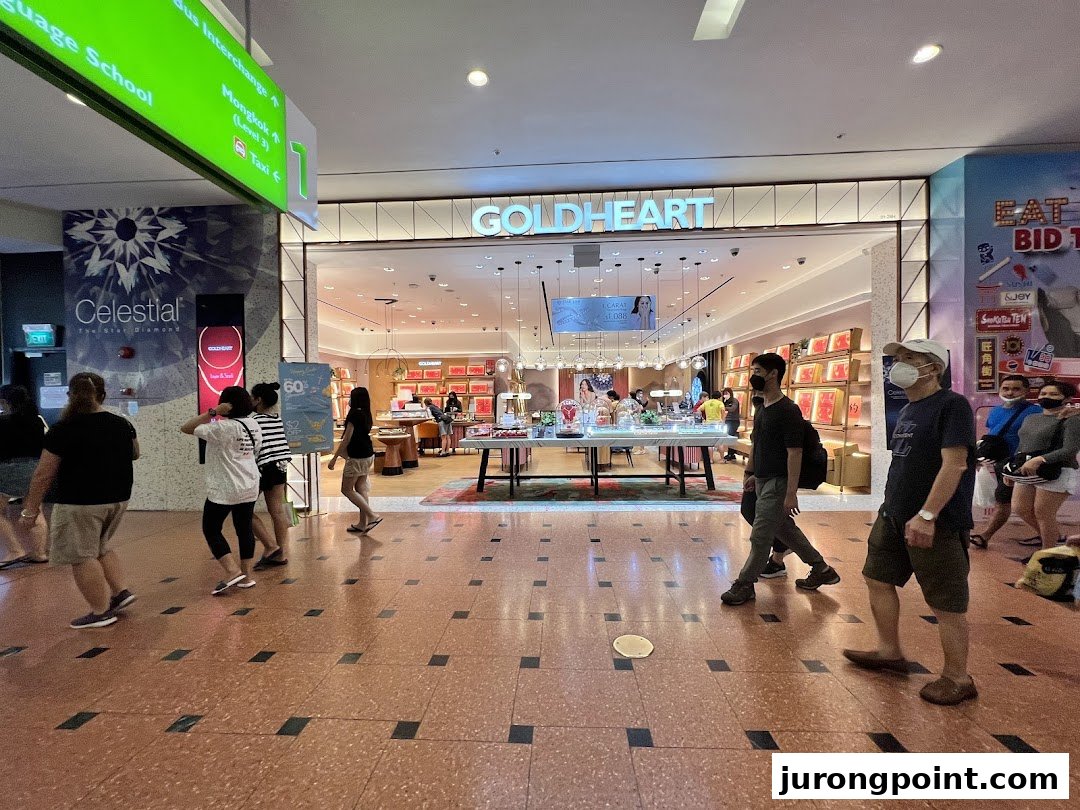 The brightly lit entrance of Goldheart Jewelry, showcasing its inviting interior and dazzling displays.