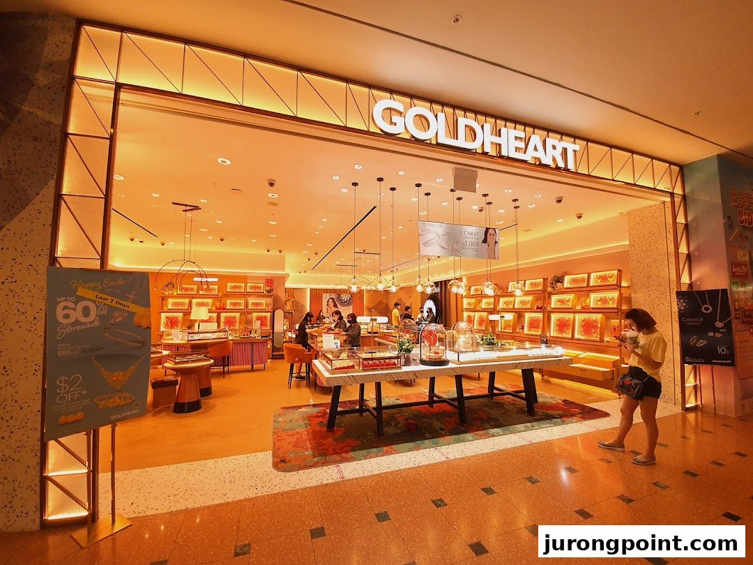 The brightly lit entrance of Goldheart Jewelry showcases sparkling displays and a welcoming interior.