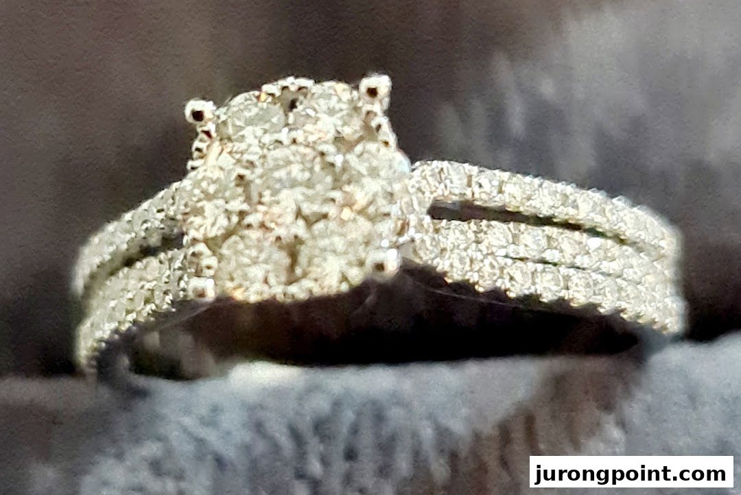 A close-up of a sparkling diamond ring featuring a cluster center and pavé-set band.
