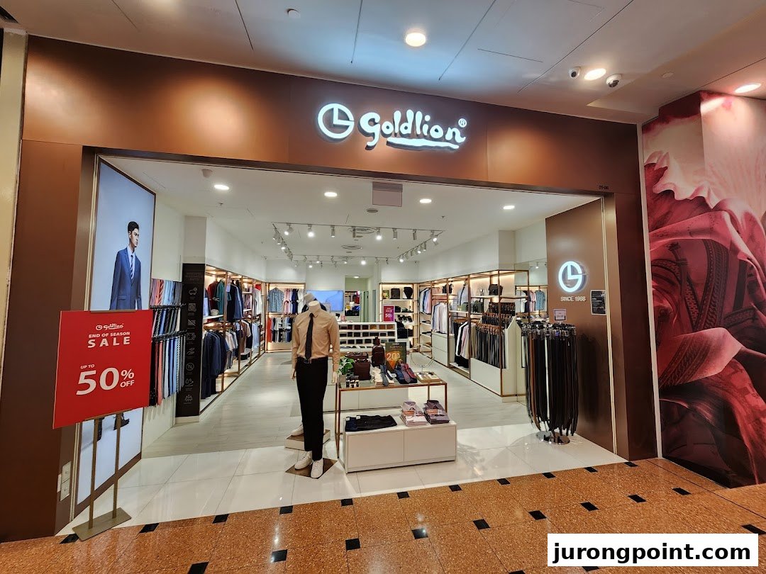 The Goldlion Apparel shop entrance showcasing menswear, accessories, and a prominent 50% off sale sign.