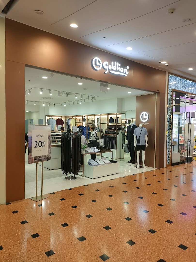 The Goldlion Apparel shop front showcasing menswear and accessories with a 20% off sign.