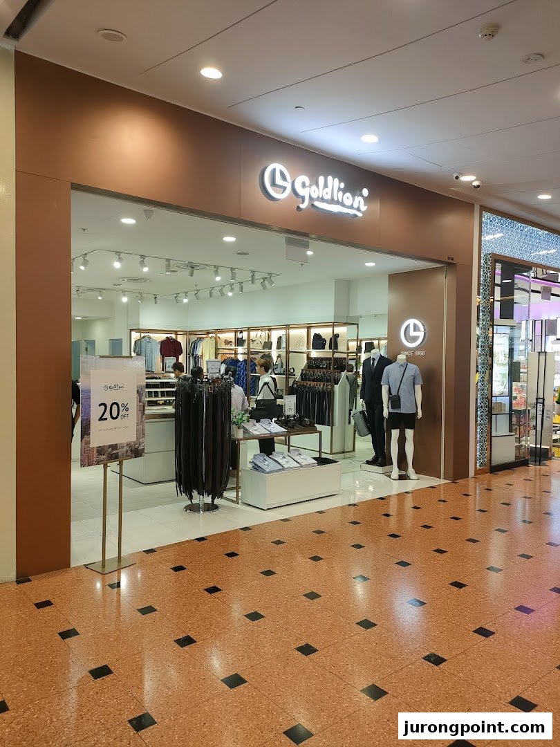 The Goldlion Apparel shop front showcasing menswear and accessories with a 20% off sign.