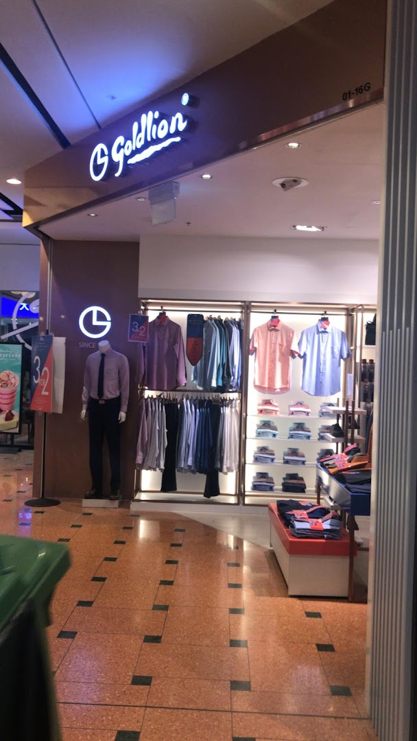 The Goldlion Apparel shop entrance features men's shirts, trousers, and accessories on display.