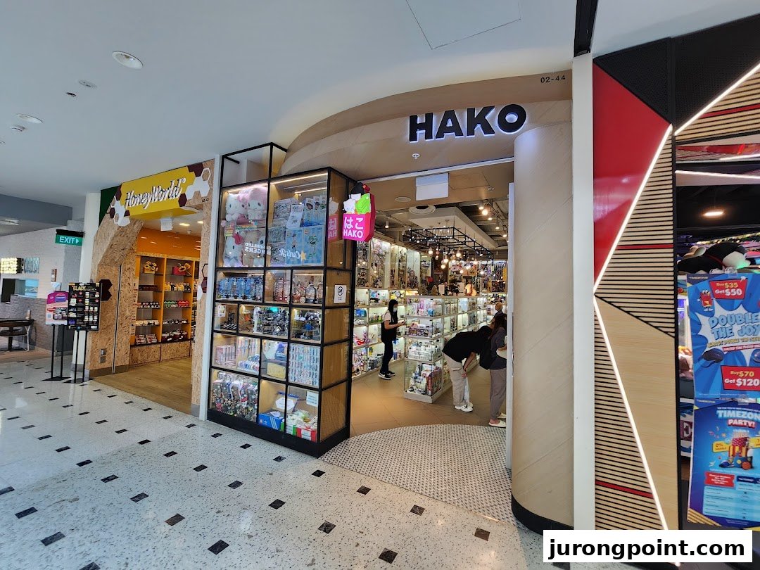 The inviting entrance of Hako, a shop filled with collectibles and unique items, featuring display cases.