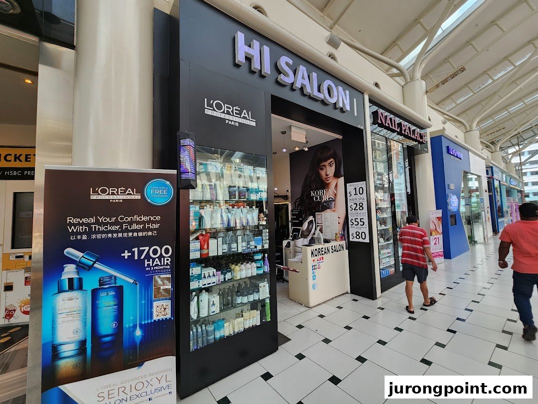 The shop front of HI Salon, a Korean salon featuring L'Oréal products and service prices.