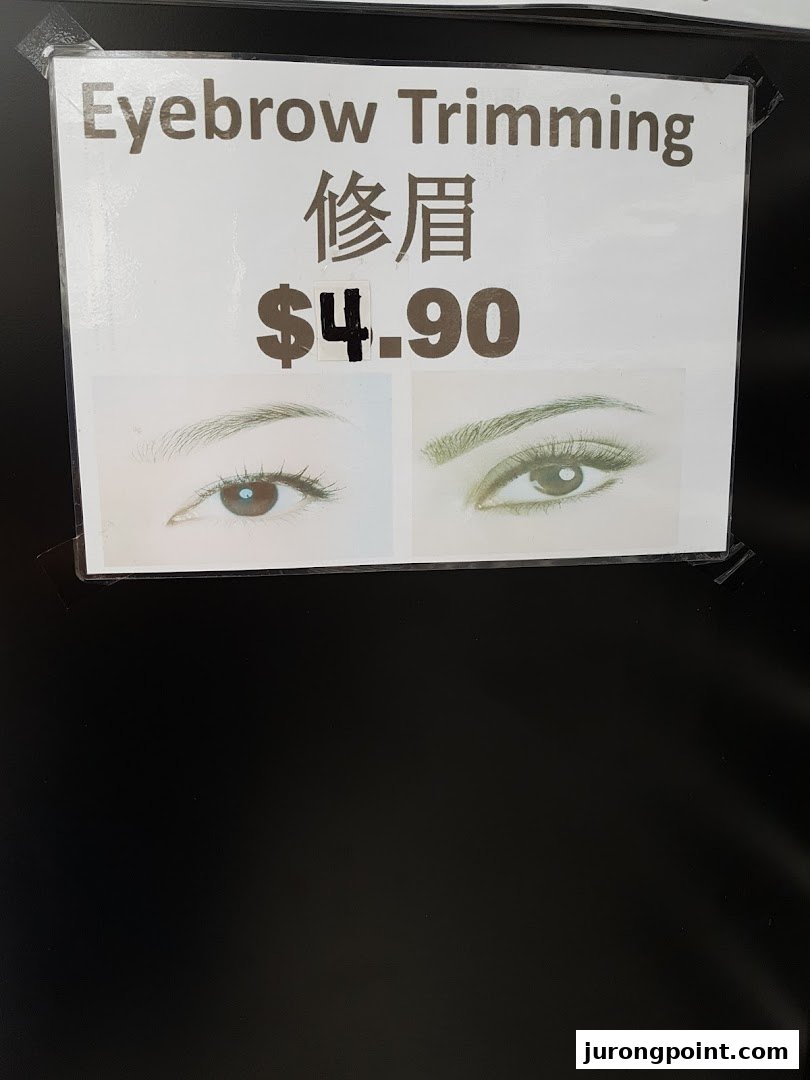 A sign advertising eyebrow trimming services for $4.90, with before-and-after visuals.