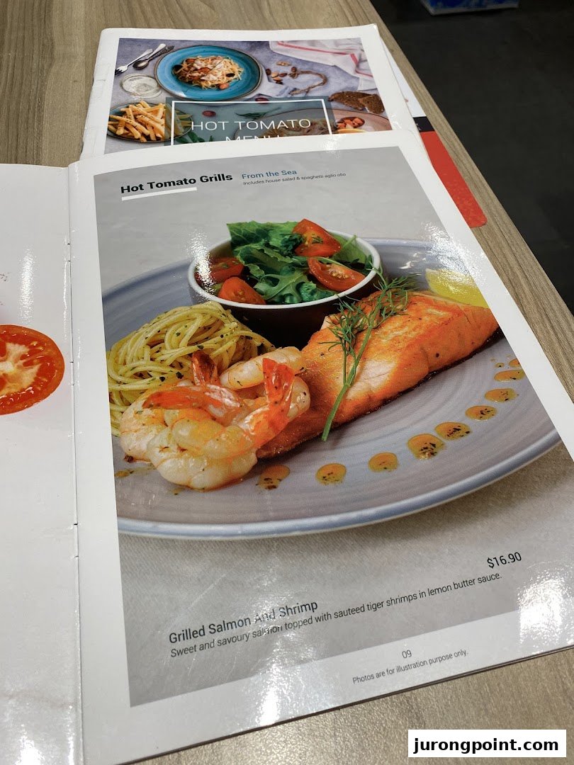 A page from the Hot Tomato menu featuring Grilled Salmon and Shrimp with spaghetti and salad.