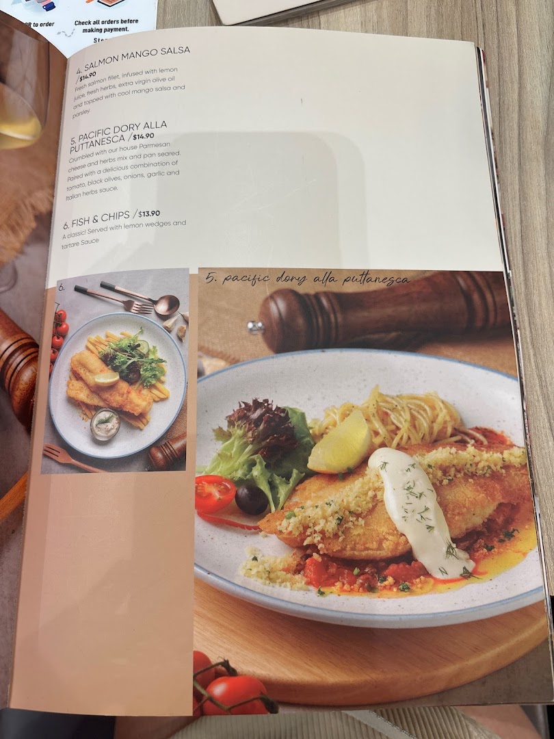 A page from the Hot Tomato menu featuring seafood dishes with descriptions and prices.