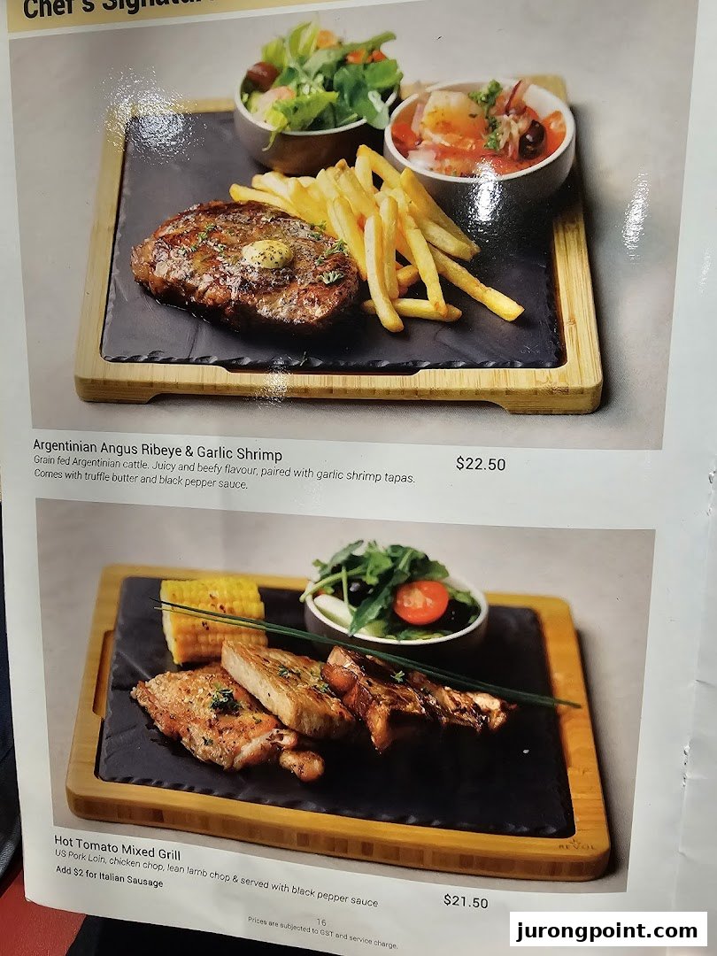 A menu page showcasing delicious Argentinian Angus Ribeye and Hot Tomato Mixed Grill dishes with prices.
