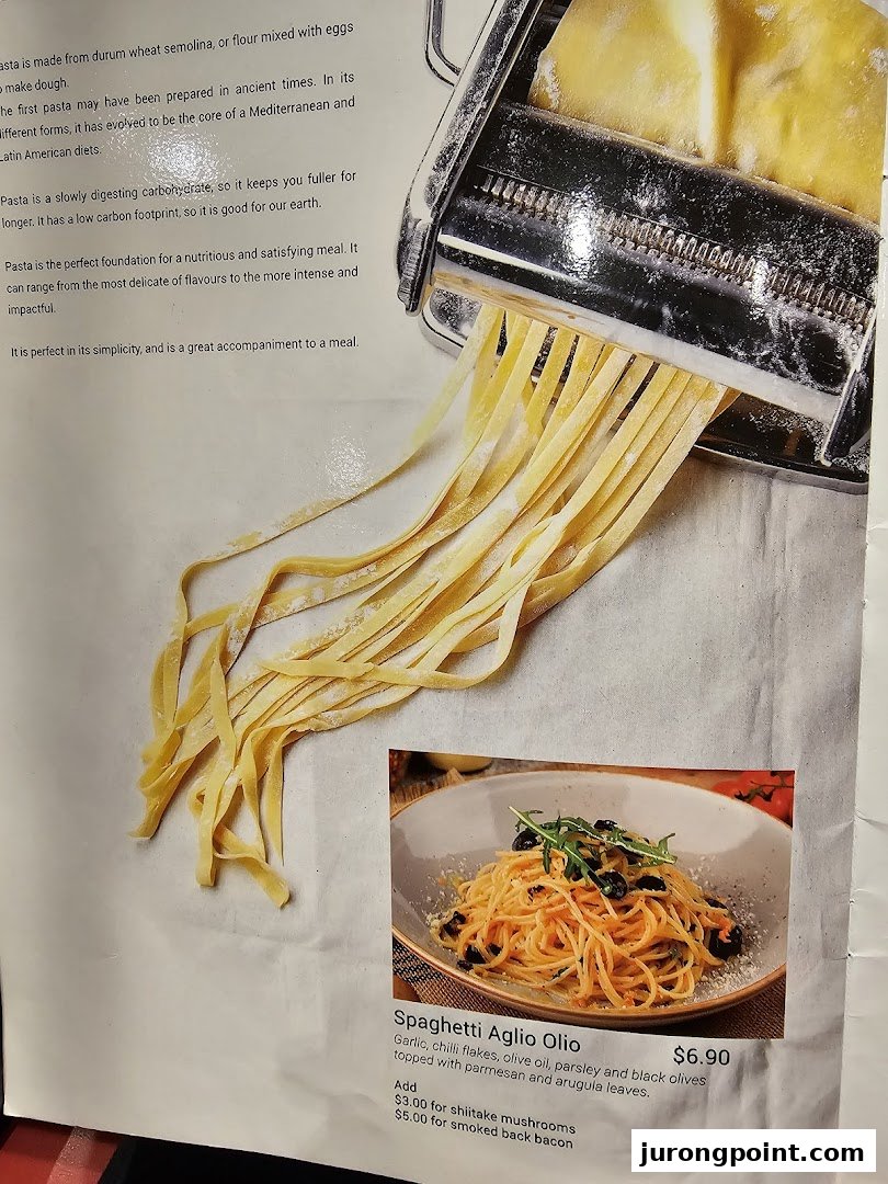 A menu page featuring fresh pasta being made and a listing for Spaghetti Aglio Olio.