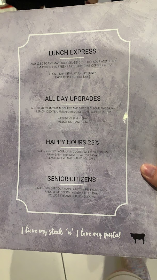 A close-up image of Hot Tomato's menu, detailing lunch specials, upgrades, and discounts.