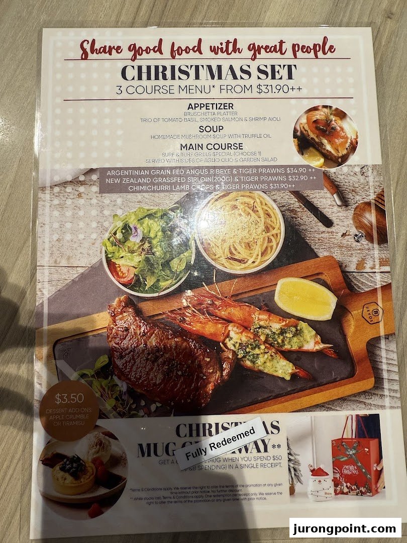 A Christmas set menu from Hot Tomato featuring a 3-course meal with surf and turf options.