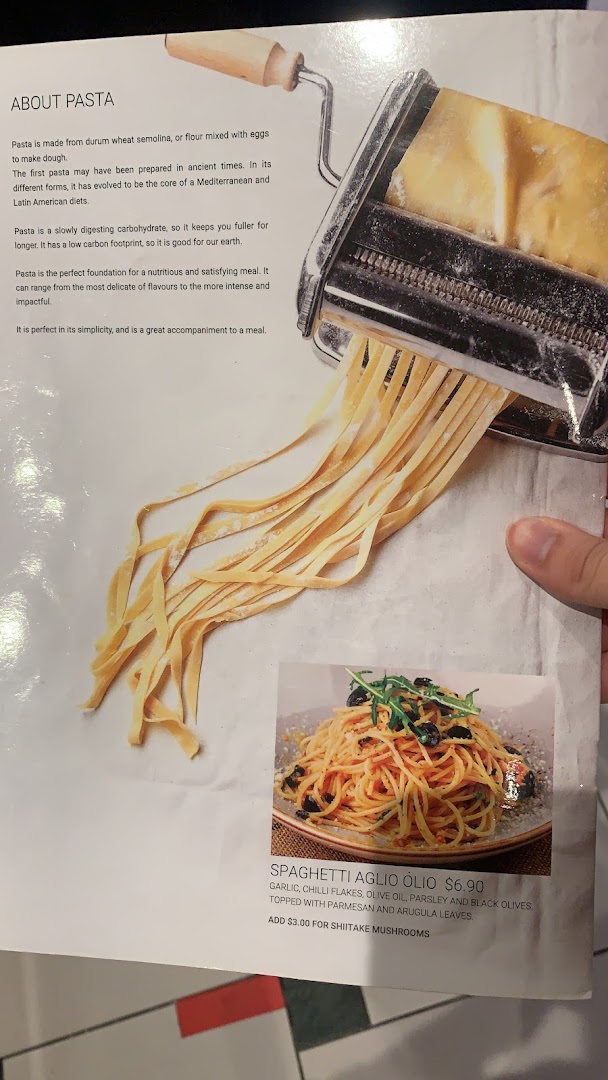 A menu page from Hot Tomato featuring Spaghetti Aglio Olio and information about pasta.