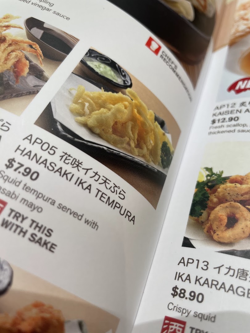 A close-up of Ichiban Boshi's menu, featuring tempura and karaage dishes.