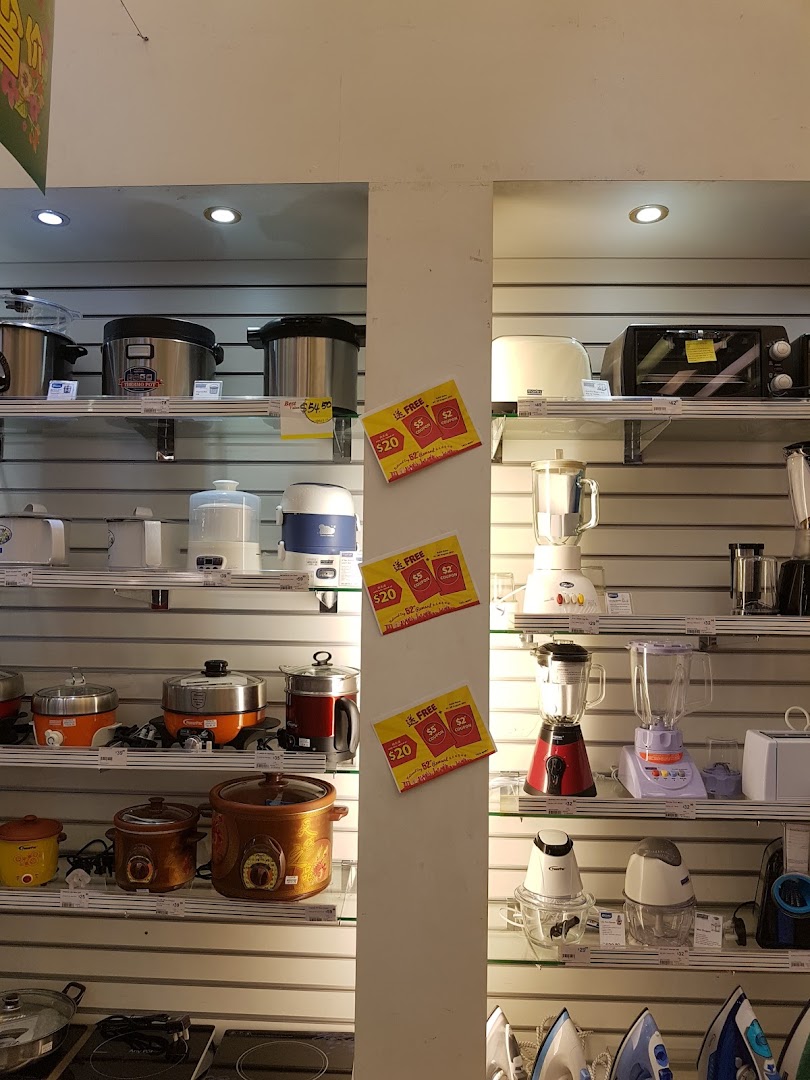 Shelves at Japan Home displaying a variety of kitchen and home appliances like rice cookers, blenders, and irons.