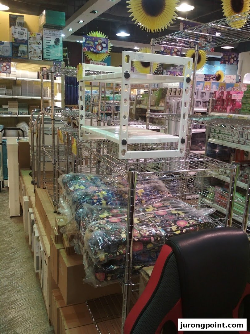 An interior view of Japan Home, showcasing various household organization products and shelving units.