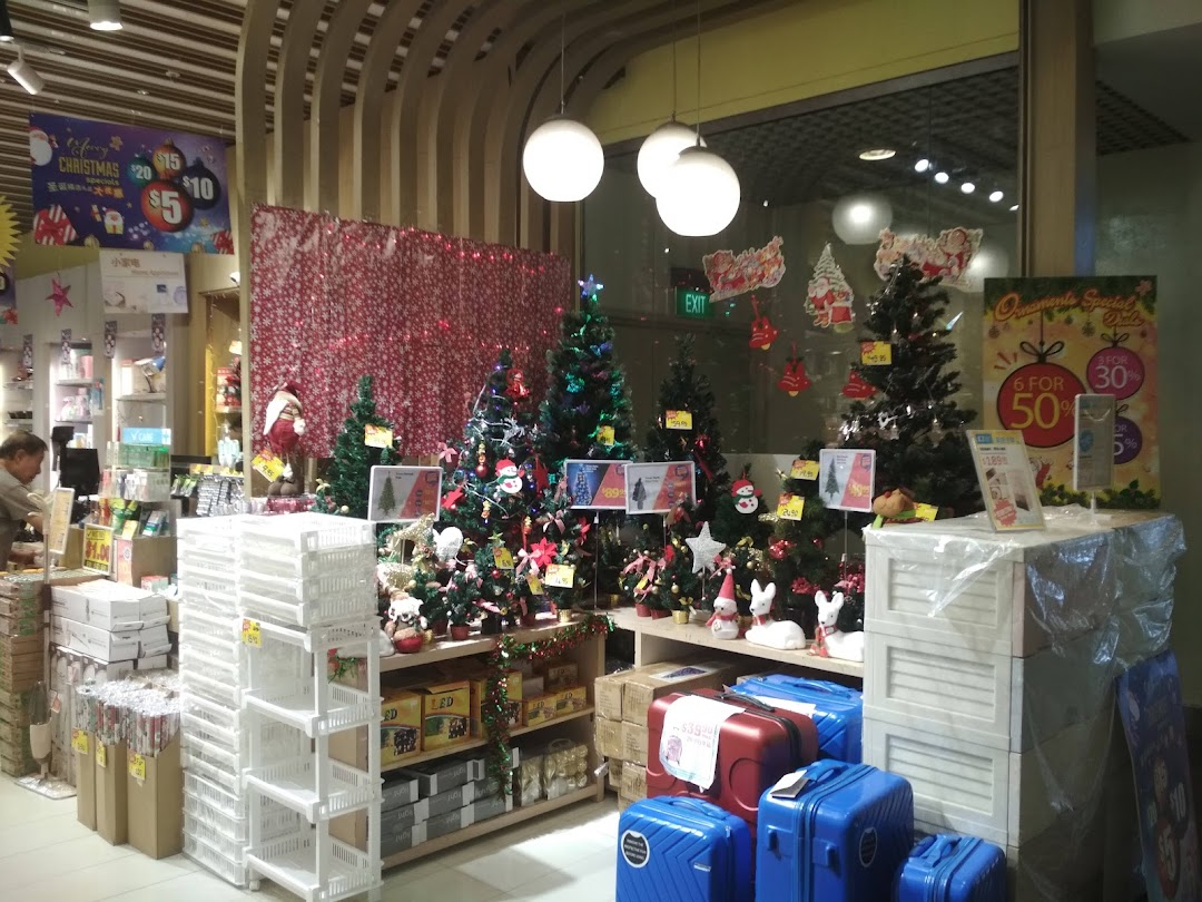 An interior view of Japan Home featuring Christmas decorations, household goods, and storage solutions.