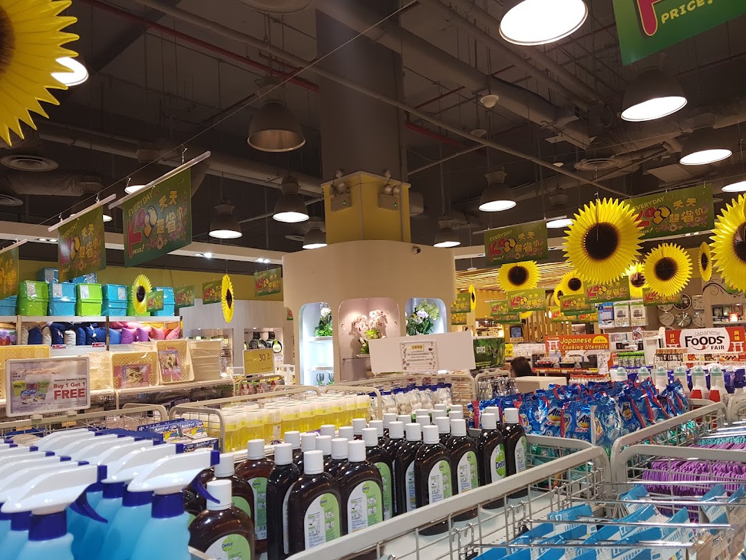 An interior view of Japan Home, showcasing aisles filled with household goods, cleaning supplies, and promotional displays.