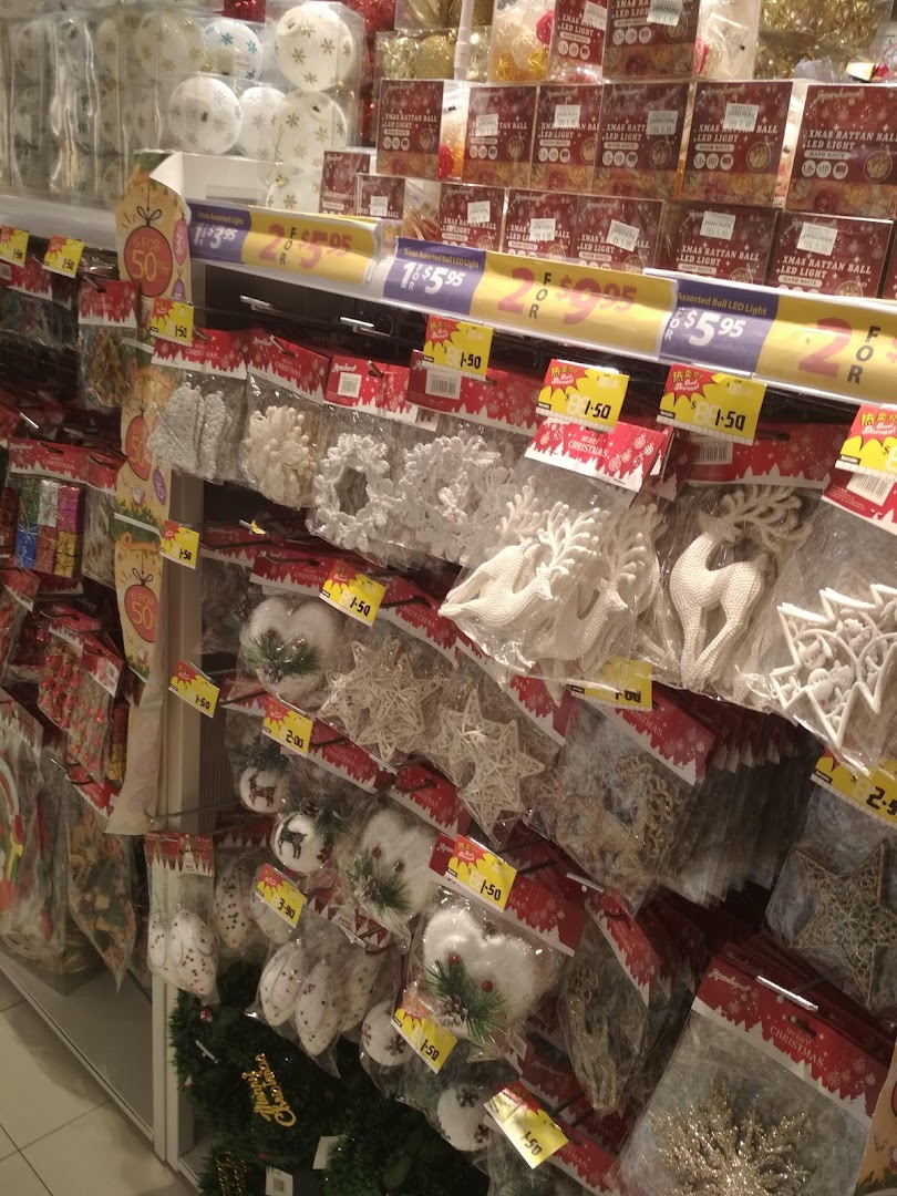A retail display at Japan Home featuring a variety of Christmas decorations, ornaments, and LED lights.