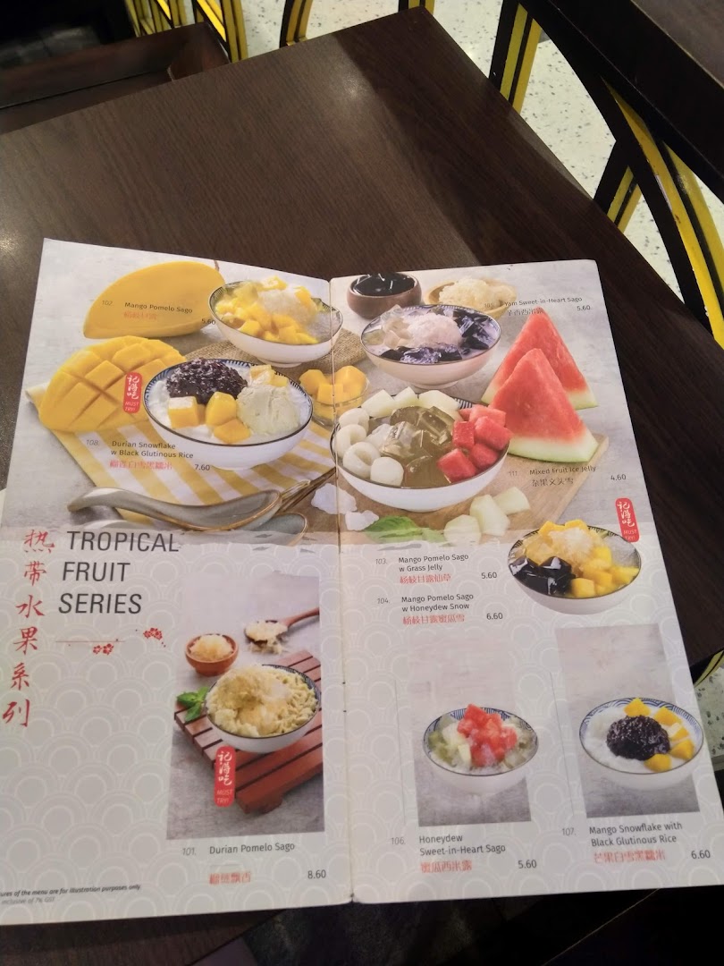 A dessert menu displaying various tropical fruit-based desserts with prices.