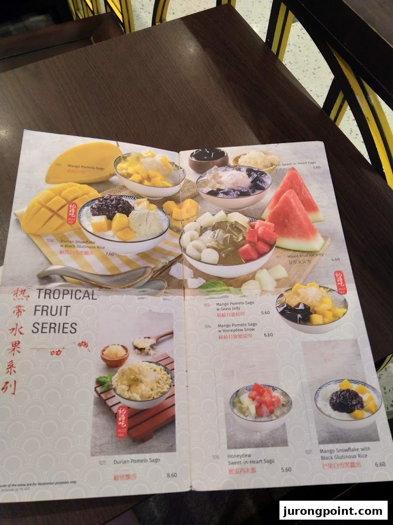 A dessert menu displaying various tropical fruit-based desserts with prices.