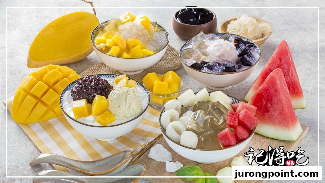 A vibrant display of various Asian desserts featuring fresh mango, watermelon, and icy treats.