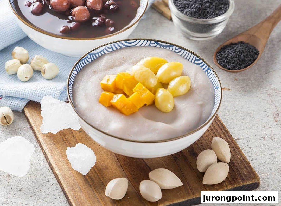 Two bowls of traditional Asian desserts, featuring taro paste with ginkgo and mango, and red bean soup.