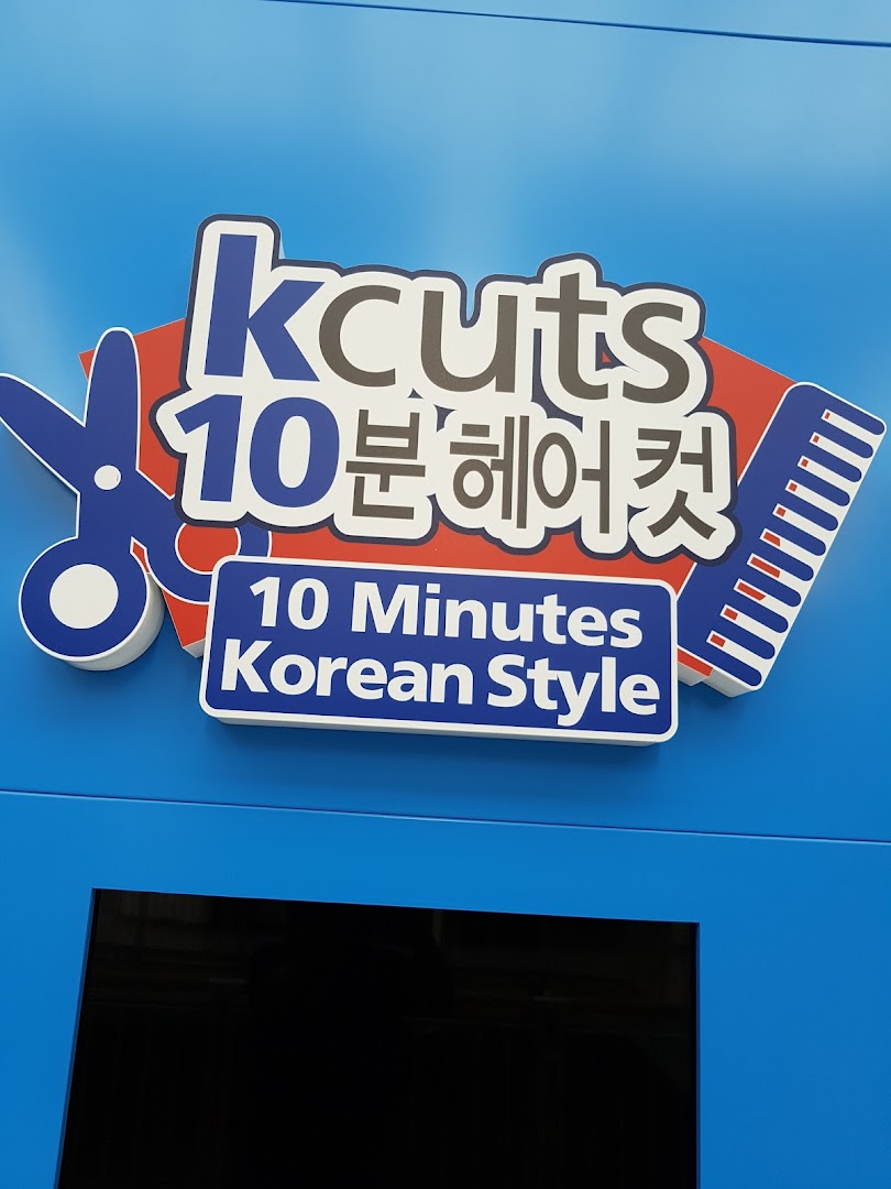 The kcuts shop front features its distinctive logo promoting 10-minute Korean style haircuts.