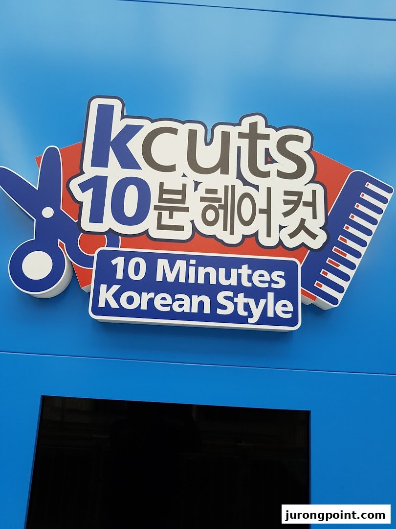 The kcuts shop front features its distinctive logo promoting 10-minute Korean style haircuts.