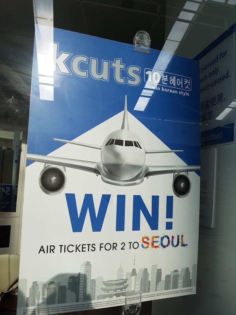 A promotional poster for kcuts, advertising a chance to win air tickets to Seoul.