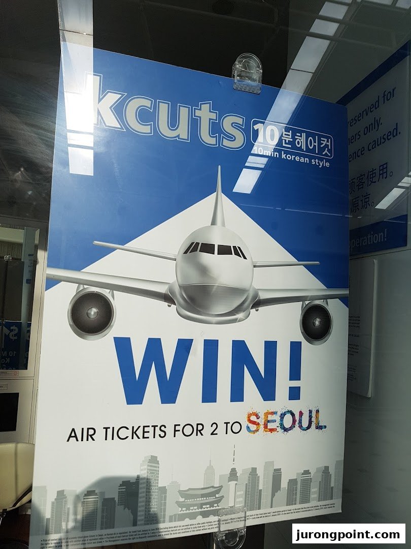 A promotional poster for kcuts, advertising a chance to win air tickets to Seoul.