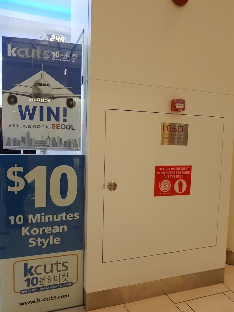 Promotional posters for kcuts, highlighting $10 Korean style haircuts and a Seoul trip giveaway.