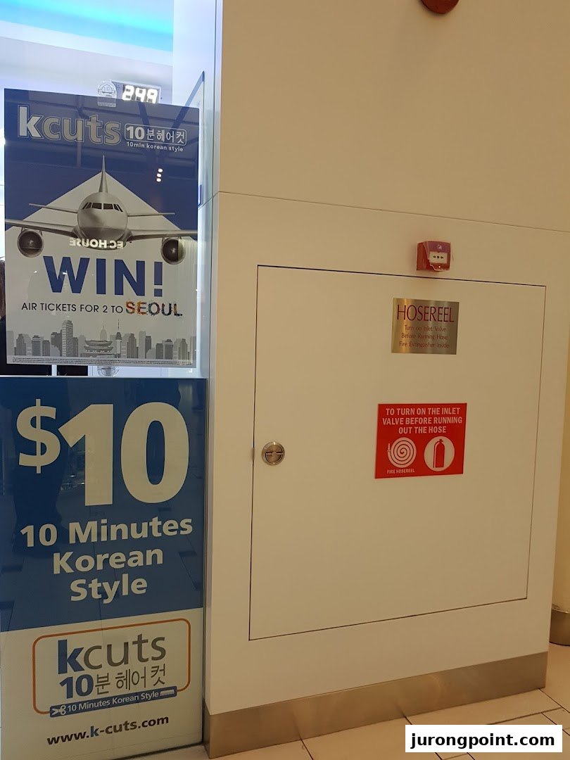 Promotional posters for kcuts, highlighting $10 Korean style haircuts and a Seoul trip giveaway.