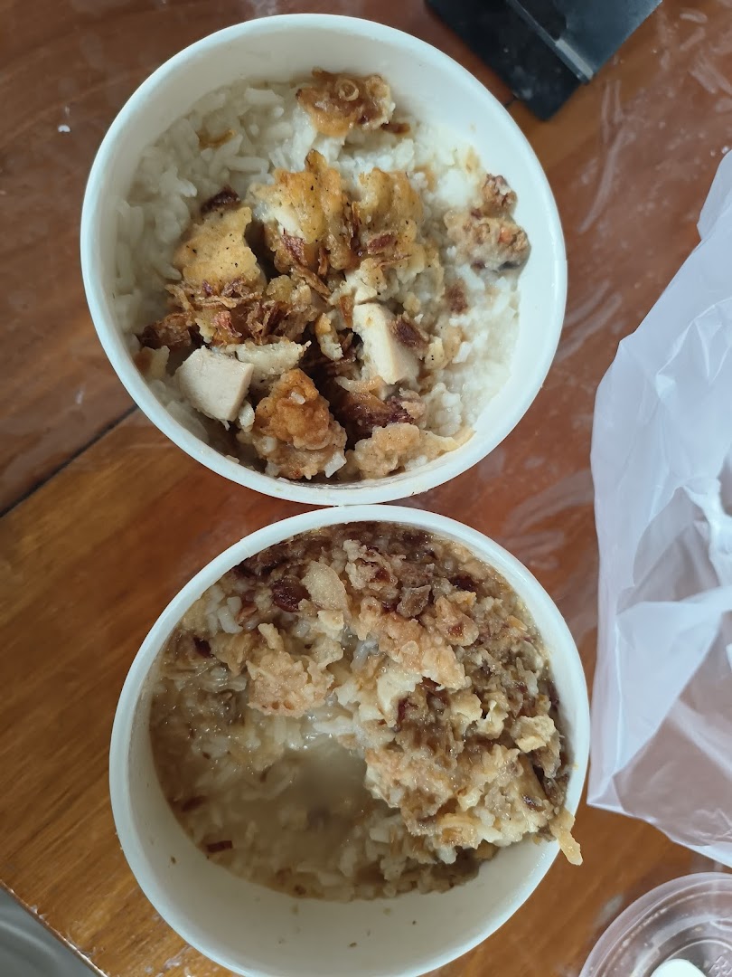 Two bowls of KFC rice with fried chicken pieces, ready to be enjoyed.
