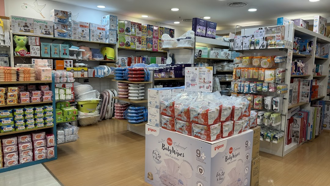 An interior view of Kiddy Palace, showcasing a wide array of baby products, diapers, and nursery essentials.