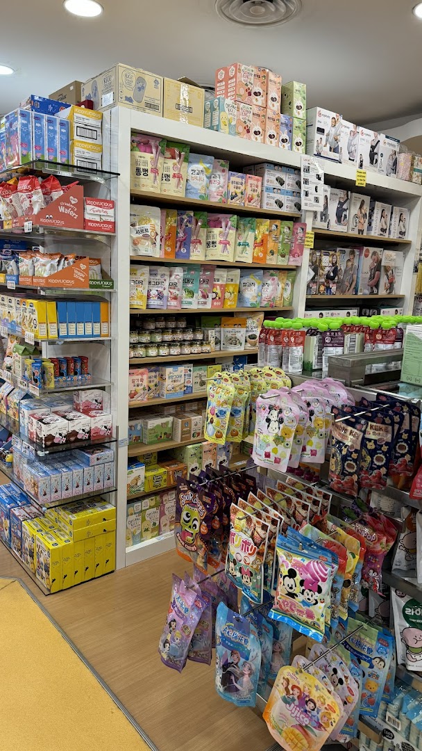 Shelves filled with a wide variety of baby food, snacks, and children's products.