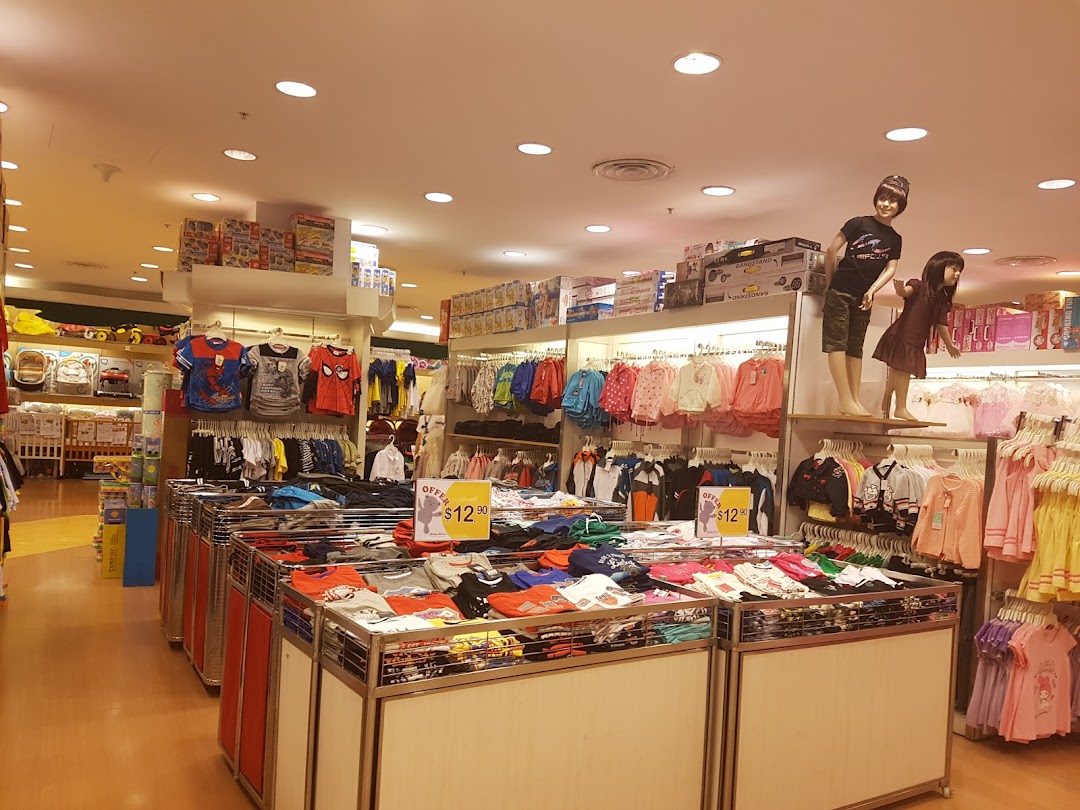 Interior view of Kiddy Palace showcasing children's apparel, toys, and accessories.