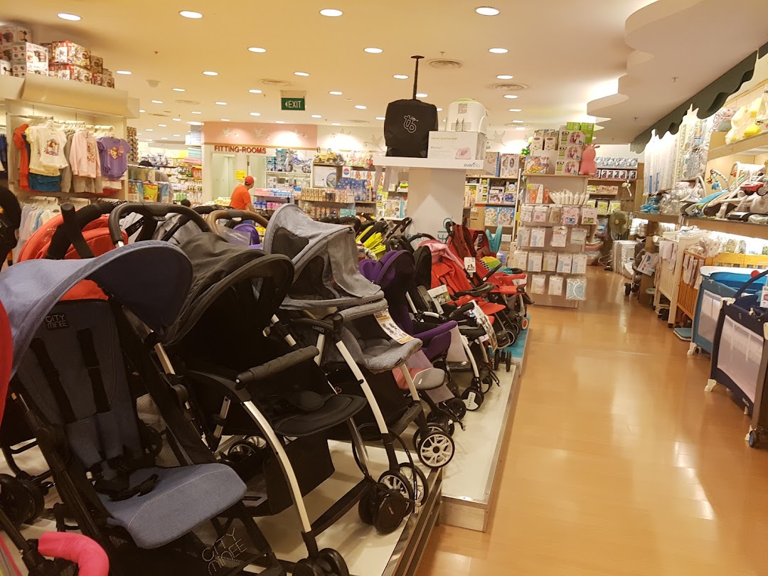 Interior view of Kiddy Palace showcasing a wide selection of strollers and various baby products.
