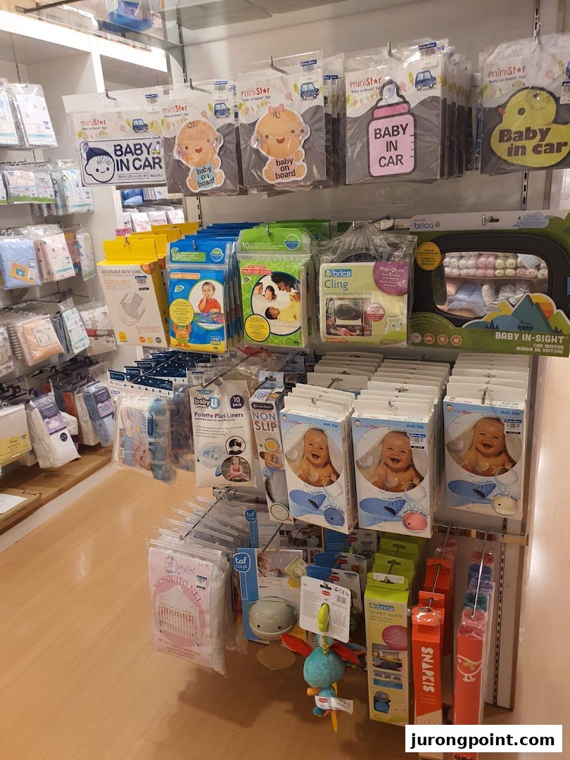 Interior view of Kiddy Palace showcasing a variety of baby essentials and accessories on display shelves.