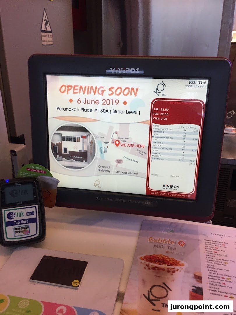 A KOI Thé point-of-sale system showing an opening announcement, transaction details, and payment terminal.