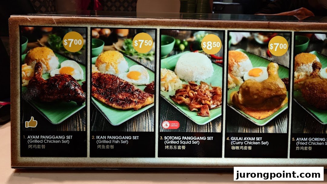 A vibrant menu board displaying various Asian-inspired grilled and fried chicken, fish, and squid sets.