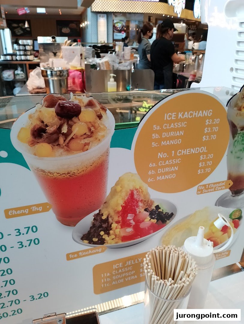 A vibrant menu display showcasing traditional Asian desserts like Ice Kachang, Chendol, and Cheng Tng.