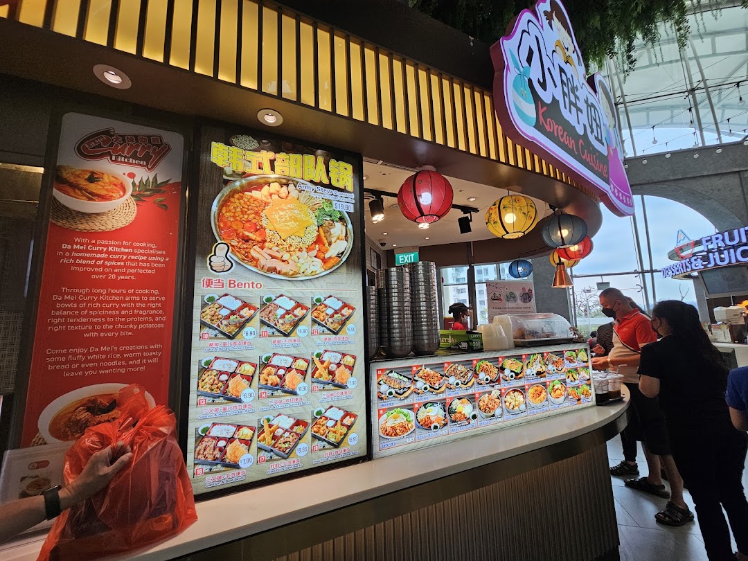 A vibrant food stall in a food hall, showcasing Korean and Curry cuisine displays with customers ordering.