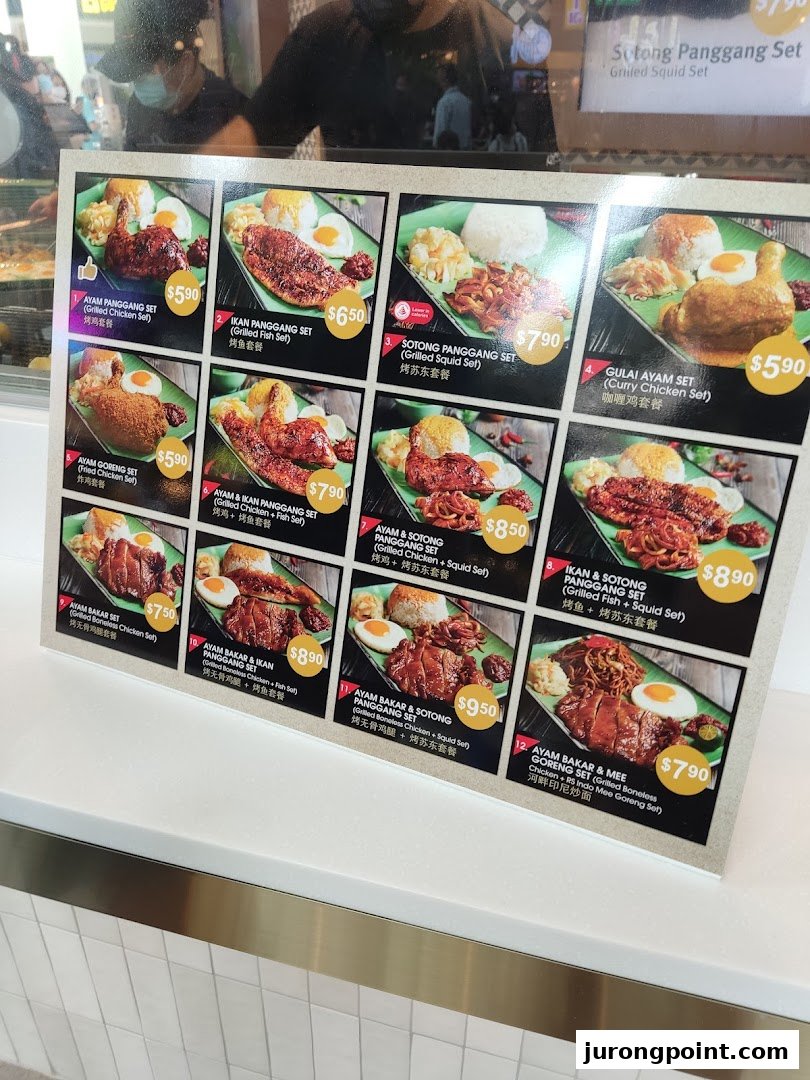 A vibrant menu board displaying various grilled and fried chicken, fish, and squid sets.