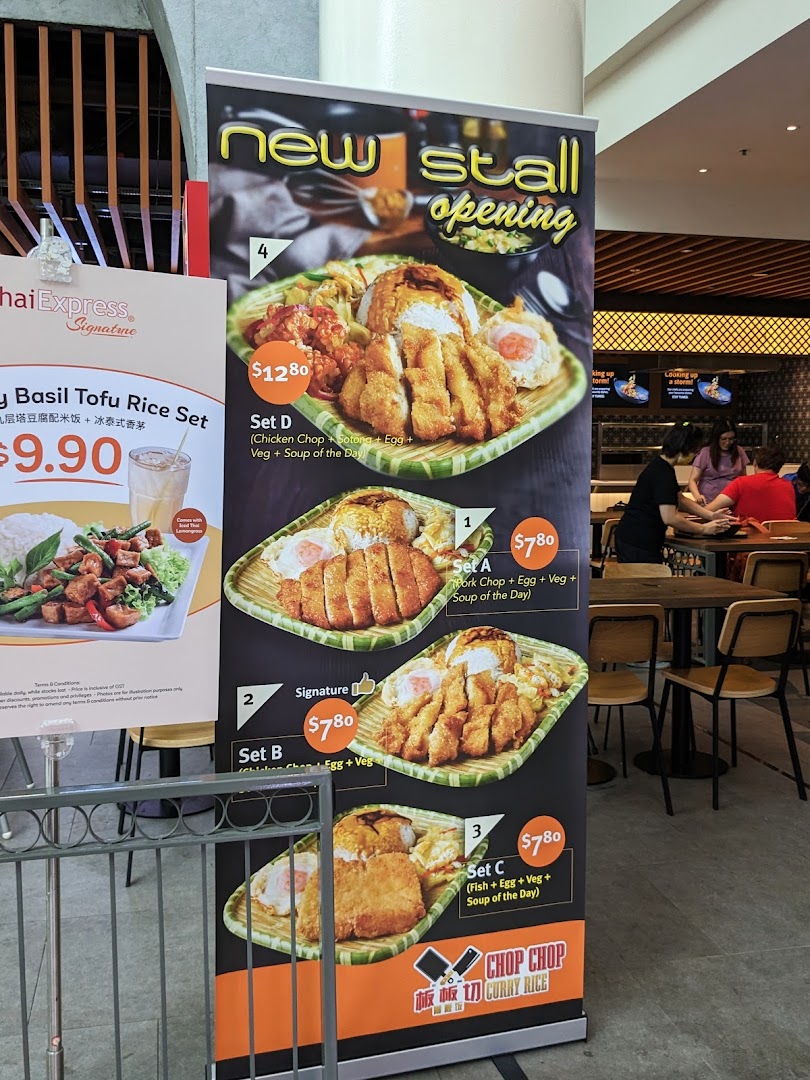A menu standee showcasing various curry rice sets from Chop Chop Curry Rice and a Thai Express dish.