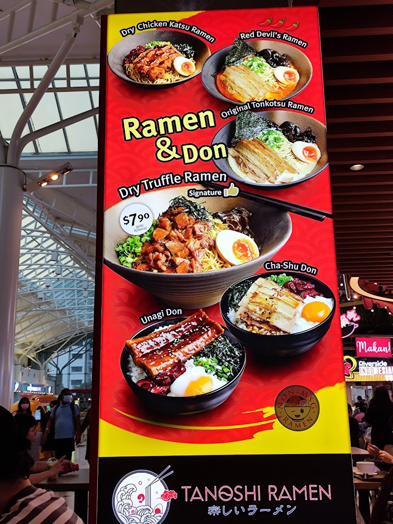 A vibrant menu board showcasing ramen and donburi dishes from Tanoshi Ramen.