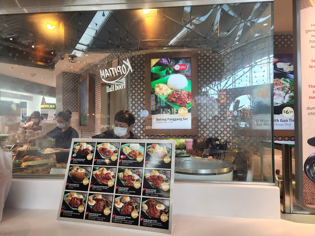 A detailed view of Kopitiam Food Hall's menu display featuring various food sets and prices.